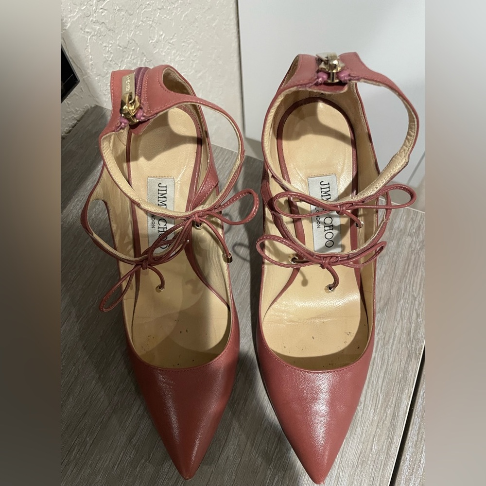 Leather Jimmy Choo double ankle strap pumps.